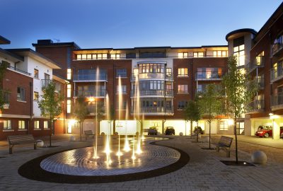 Commercial water feature lit up at night