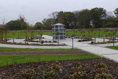 Circular paved paths surrounded by lawn