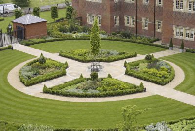 Public open space landscaping with paved circle path
