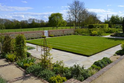 Paving surrounding grass lawn