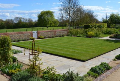 Artificial turf in landscaped garden