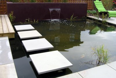 Garden pond with water feature